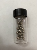 Nickel group: multiple beads of |ni|, a bead of |pd|, and a bead of |pt| in bottles