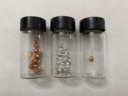 Copper group: oddly shaped beads of |cu| and |ag|, and a bead of |au| in bottles