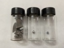 Iron group: |fe| chunks, |ru| bead, and an |os| bead in bottles