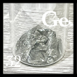 Silvery Germanium chunks in bottle