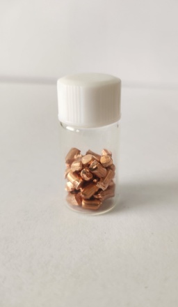 Copper pellets in a bottle