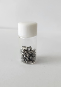 Iron pellets in a bottle