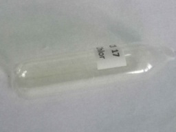 Chlorine gas in an ampoule. Difficult to see, but a faint yellow color is there.