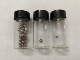 Nickel group: multiple beads of |ni|, a bead of |pd|, and a bead of |pt| in bottles