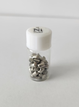 Nickel pellets in a bottle