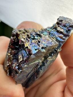 100 gram Vanadium metal chunk, showing blue, green, gold, and purple colors resulting from a thin layer of oxidation.