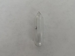 Oxygen in an ampoule. Normally an invisible gas, Oxygen glows a faint white-blue when put under high voltage.