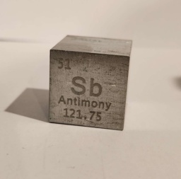 Rough and dull-gray cube of Antimony 1 inch in size