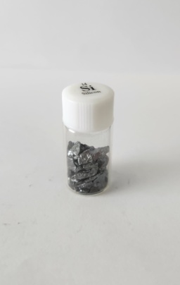 Small pieces of Silicon in a small bottle with lid