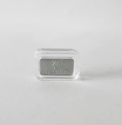 1 gram of Zinc as a mini bullion bar, inside a clear case.