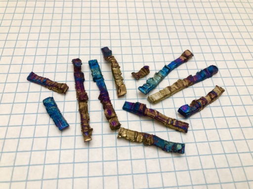 Oxidized miniature Vanadium bars showing brilliant colors