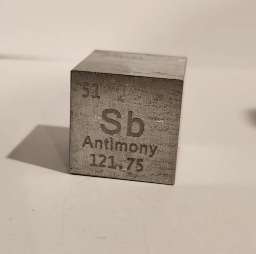 Rough and dull-gray cube of Antimony 1 inch in size