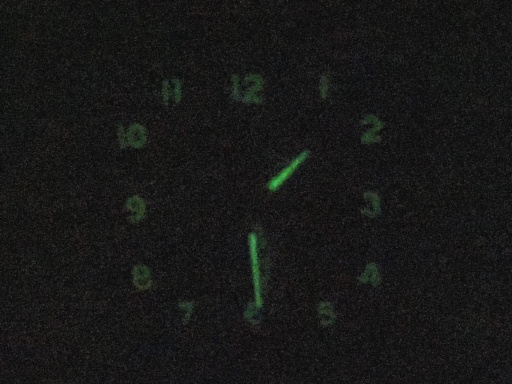 A Mauthe brand alarm clock with Radium paint. First photo in the daylight, second photo in the dark showing the glow more easily.