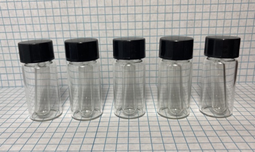 The Noble Gas group, in ampoules. There's not much to see here. From left to right: |he|, |ne|, |ar|, |kr|, |xe|.